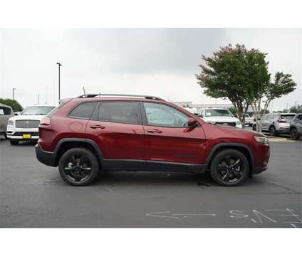 2021 Jeep Cherokee Altitude is a Red 2021 Jeep Cherokee Altitude Car for Sale in Georgetown TX