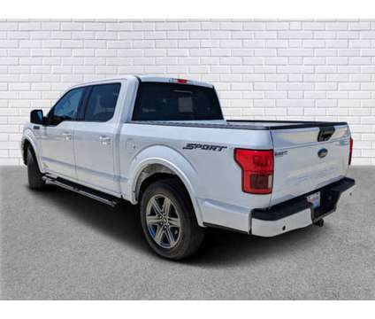 2020 Ford F-150 XLT is a White 2020 Ford F-150 XLT Car for Sale in Collins MS