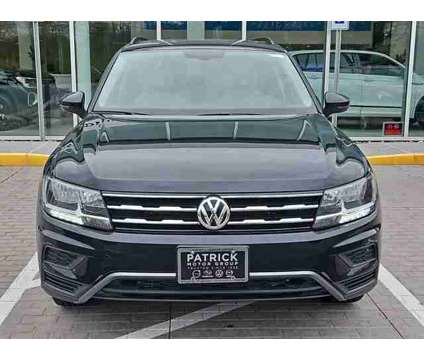 2021 Volkswagen Tiguan SE is a Black 2021 Volkswagen Tiguan SE Car for Sale in Auburn MA