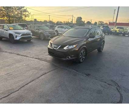 2017 Nissan Rogue Sport SL is a Brown 2017 Nissan Rogue Car for Sale in Lexington KY