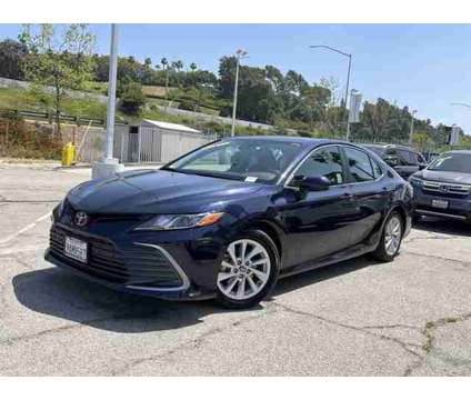 2022 Toyota Camry LE is a Blue 2022 Toyota Camry LE Car for Sale in Los Angeles CA