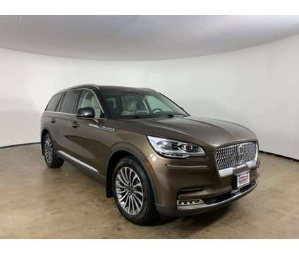 2022 Lincoln Aviator Reserve is a Tan 2022 Lincoln Aviator Car for Sale in Peoria IL