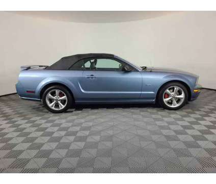 2006 Ford Mustang GT Deluxe is a Blue 2006 Ford Mustang GT Car for Sale in Brighton CO