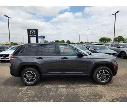 2022 Jeep Grand Cherokee Trailhawk is a Grey 2022 Jeep grand cherokee Trailhawk Car for Sale in Lubbock TX