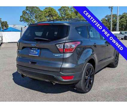 2017 Ford Escape Titanium is a Silver 2017 Ford Escape Titanium Car for Sale in Sarasota FL