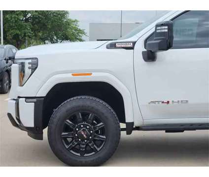 2024 GMC Sierra 2500HD 4WD Crew Cab Standard Bed AT4 is a White 2024 GMC Sierra 2500 H/D Car for Sale in Plano TX