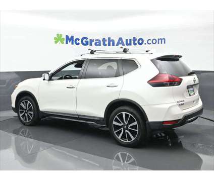 2019 Nissan Rogue SL is a White 2019 Nissan Rogue SL Station Wagon in Dubuque IA