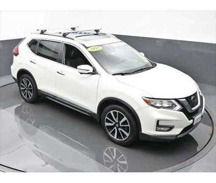 2019 Nissan Rogue SL is a White 2019 Nissan Rogue SL Station Wagon in Dubuque IA