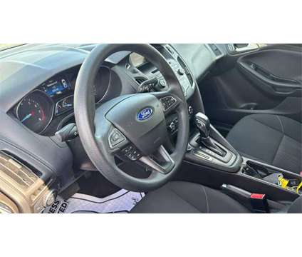 2016 Ford Focus SE is a Silver 2016 Ford Focus SE Sedan in Akron OH