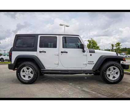 2017 Jeep Wrangler Unlimited Sport is a White 2017 Jeep Wrangler Unlimited SUV in Moss Point MS