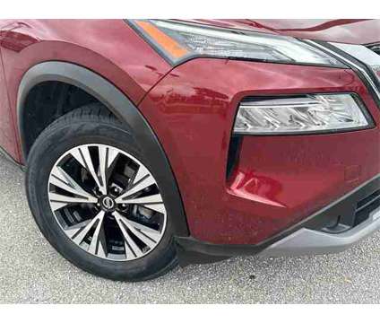 2021 Nissan Rogue SV is a Red 2021 Nissan Rogue SV SUV in Stuart FL