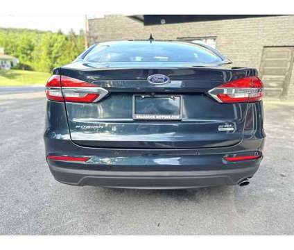 2020 Ford Fusion SEL is a Blue 2020 Ford Fusion SEL Sedan in Hagerstown, MD MD