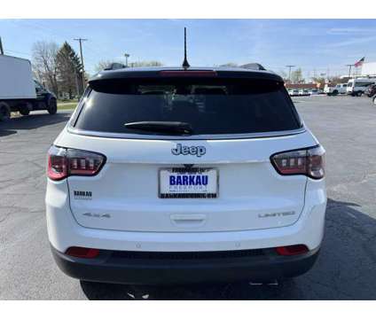 2021 Jeep Compass Limited is a White 2021 Jeep Compass Limited SUV in Freeport IL