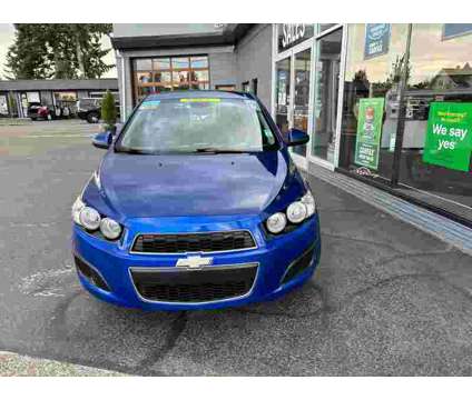 2013 Chevrolet Sonic Blue, 100K miles is a Blue 2013 Chevrolet Sonic LT Car for Sale in Auburn WA