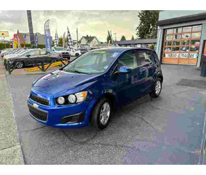 2013 Chevrolet Sonic Blue, 100K miles is a Blue 2013 Chevrolet Sonic LT Car for Sale in Auburn WA
