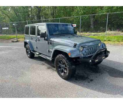 2014 Jeep Wrangler for sale is a Grey 2014 Jeep Wrangler Car for Sale in Mount Joy PA