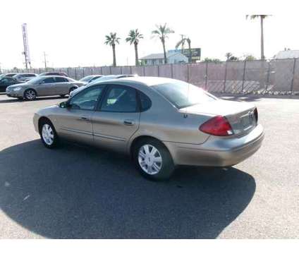 2003 Ford Taurus for sale is a Tan 2003 Ford Taurus Car for Sale in Mesa AZ