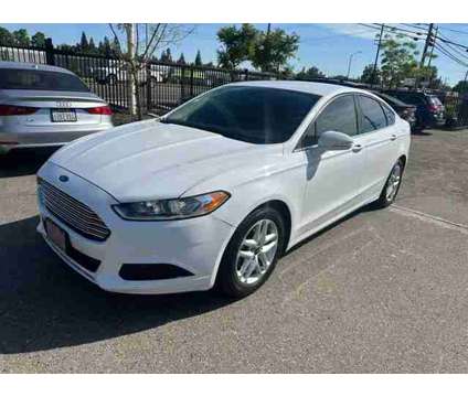 2014 Ford Fusion for sale is a White 2014 Ford Fusion Car for Sale in Sacramento CA