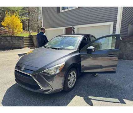 Used 2019 TOYOTA YARIS For Sale is a Grey 2019 Toyota Yaris Car for Sale in Tyngsboro MA