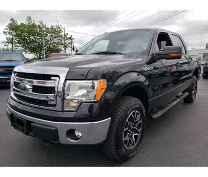 2014 Ford F-150 XLT is a Black 2014 Ford F-150 XLT Car for Sale in Lexington KY
