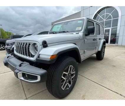 2024 Jeep Wrangler Sahara is a Silver 2024 Jeep Wrangler Sahara Car for Sale in Pataskala OH