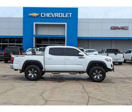 2019 Toyota Tacoma 4WD TRD Sport is a White 2019 Toyota Tacoma Car for Sale in Brookhaven MS