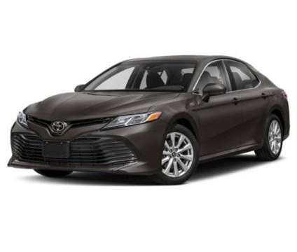 2018 Toyota Camry LE is a Blue 2018 Toyota Camry LE Car for Sale in Tampa FL