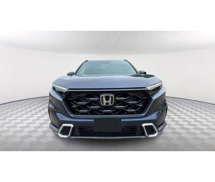 2024 Honda CR-V Hybrid Sport Touring is a Blue 2024 Honda CR-V Hybrid in Saratoga Springs NY