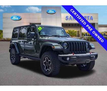 2023 Jeep Wrangler Rubicon is a Green 2023 Jeep Wrangler Rubicon Car for Sale in Sarasota FL