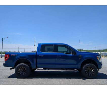 2023 Ford F-150 XLT is a Blue 2023 Ford F-150 XLT Car for Sale in Winder GA