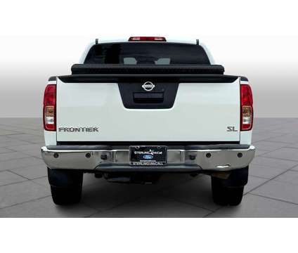 2013UsedNissanUsedFrontierUsed2WD Crew Cab LWB Auto is a White 2013 Nissan frontier Car for Sale in Houston TX