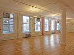 Soho office loft with exposed brick