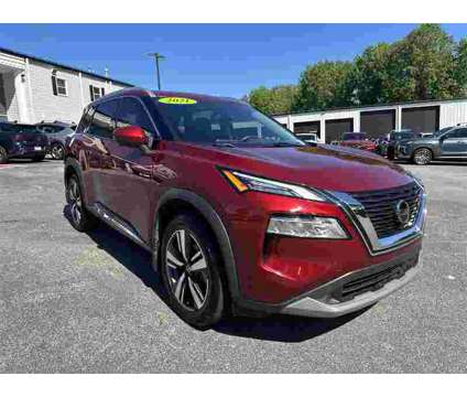 2021 Nissan Rogue SL is a Red 2021 Nissan Rogue SL SUV in Newnan GA