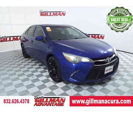 2015 Toyota Camry SE is a Blue 2015 Toyota Camry SE Sedan in Houston TX