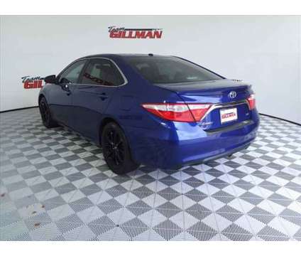 2015 Toyota Camry SE is a Blue 2015 Toyota Camry SE Sedan in Houston TX