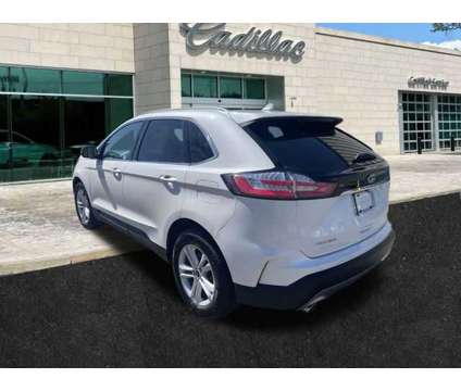 2019 Ford Edge SEL is a Silver, White 2019 Ford Edge SEL SUV in Albany NY