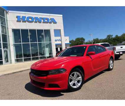 2021 Dodge Charger SXT is a Red 2021 Dodge Charger SXT Sedan in Vicksburg MS