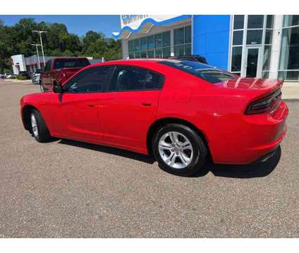 2021 Dodge Charger SXT is a Red 2021 Dodge Charger SXT Sedan in Vicksburg MS