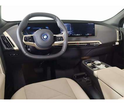 2024 BMW iX xDrive50 is a Black 2024 BMW 325 Model iX SUV in Edmond OK