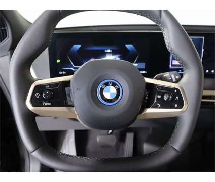 2024 BMW iX xDrive50 is a Black 2024 BMW 325 Model iX SUV in Edmond OK