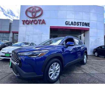 2024 Toyota Corolla Cross LE is a Blue 2024 Toyota Corolla LE SUV in Gladstone OR