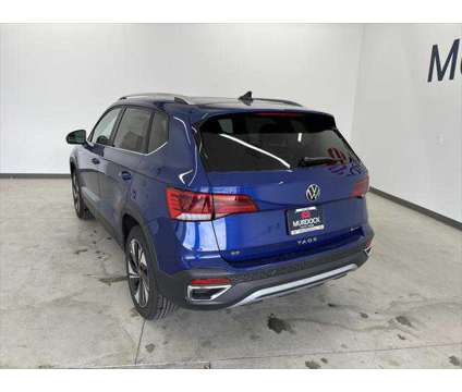 2024 Volkswagen Taos 1.5T SE is a Blue 2024 SUV in Logan UT