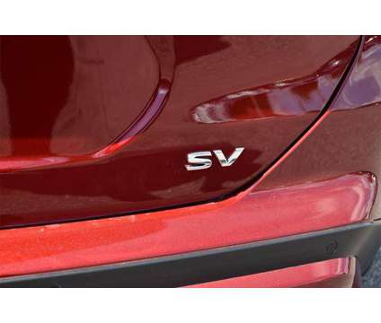 2024 Nissan Kicks SV Xtronic CVT is a Red 2024 Nissan Kicks SV Station Wagon in Orlando FL