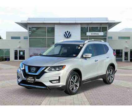 2017 Nissan Rogue SL is a Silver 2017 Nissan Rogue SL SUV in Sterling VA