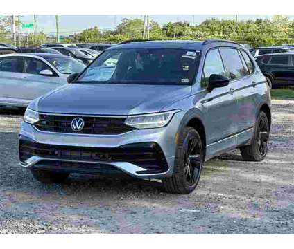 2024 Volkswagen Tiguan SE R-Line Black is a Silver 2024 Volkswagen Tiguan SE SUV in Sterling VA