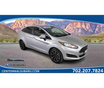 2015 Ford Fiesta SE is a Silver 2015 Ford Fiesta SE Sedan in Las Vegas NV