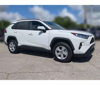 2021 Toyota RAV4 XLE is a White 2021 Toyota RAV4 XLE SUV in Vero Beach FL