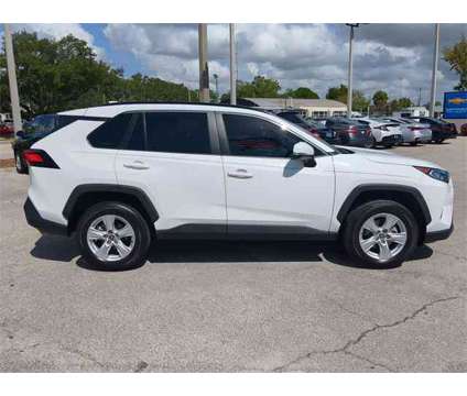 2021 Toyota RAV4 XLE is a White 2021 Toyota RAV4 XLE SUV in Vero Beach FL