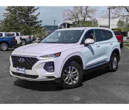 2019 Hyundai Santa Fe SE 2.4 is a White 2019 Hyundai Santa Fe SE SUV in Boulder CO