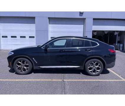 2021 BMW X4 xDrive30i is a Black 2021 BMW X4 xDrive30i SUV in Freeport NY